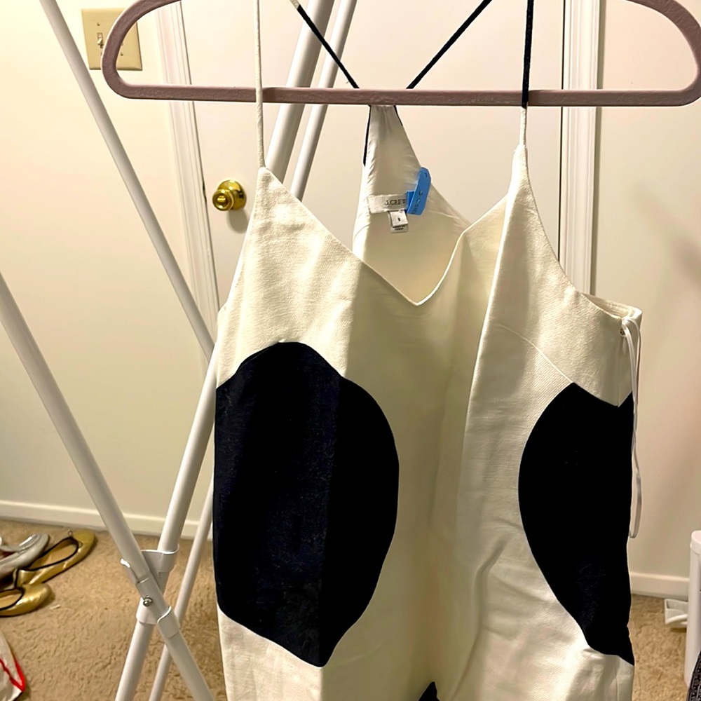 Stunning polka dot dress.  Very unique and flattering.